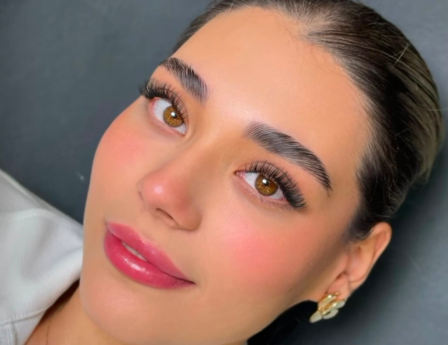 Polished beauty portrait with long, balanced eyelash extensions